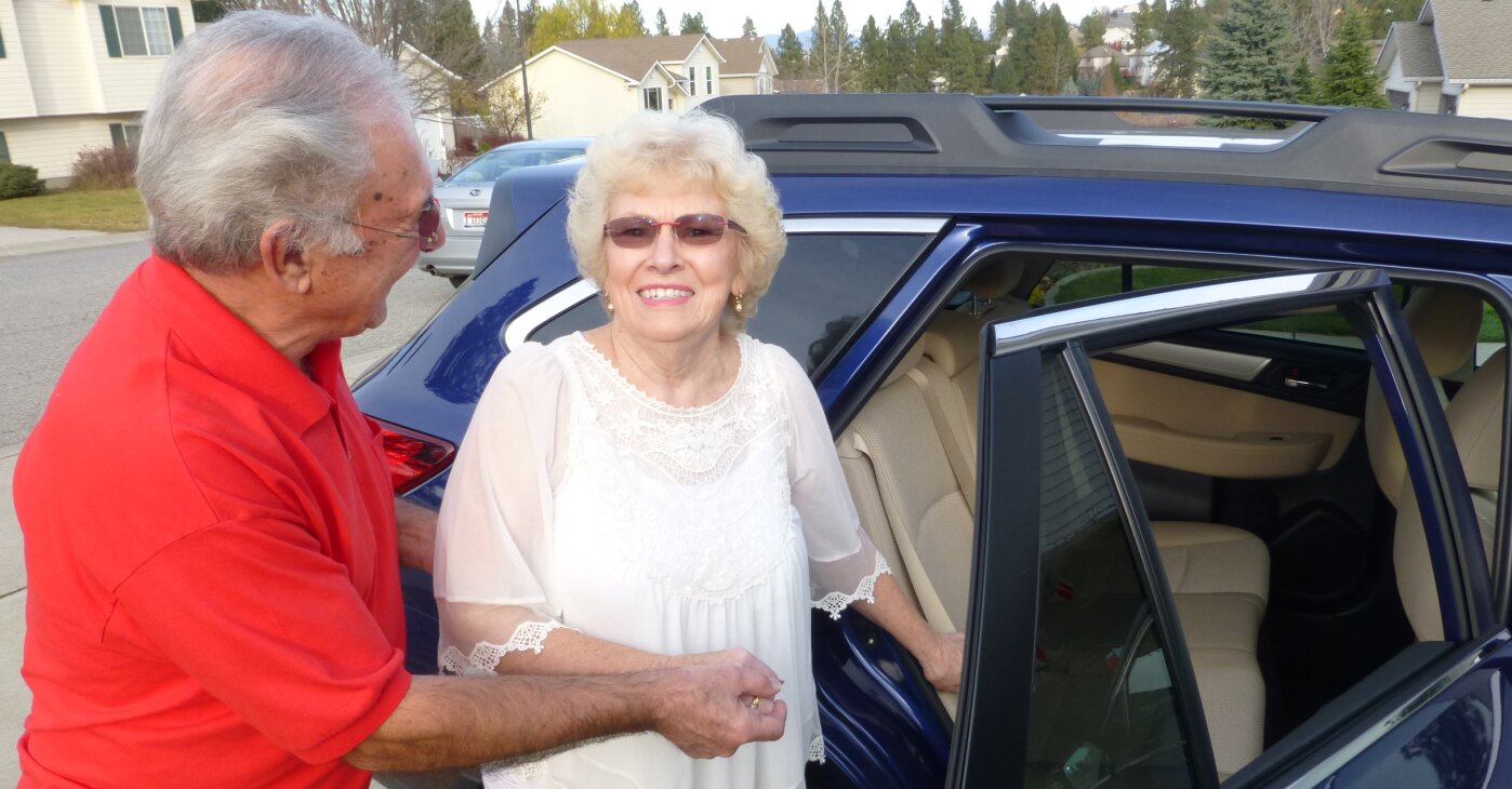 Senior Couple Entering Car